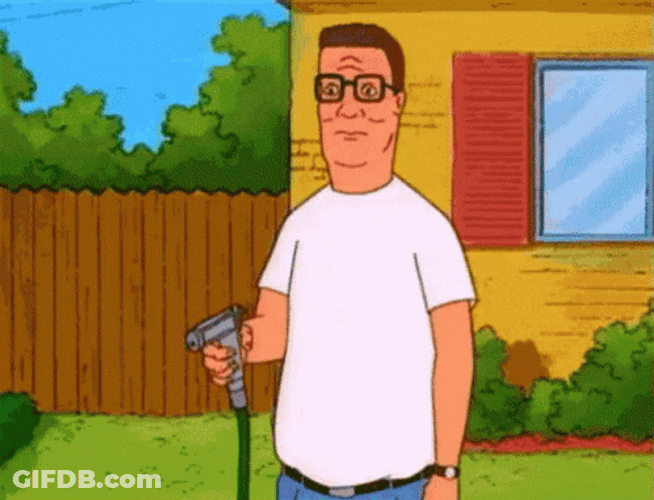 Spraying Water On His Ear Hank Hill GIF