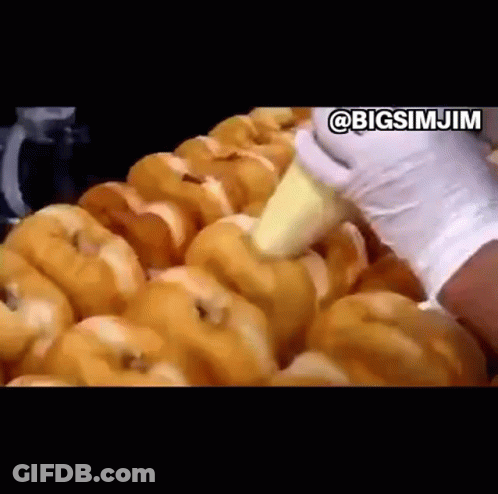 Spreading Butter On Donuts GIF