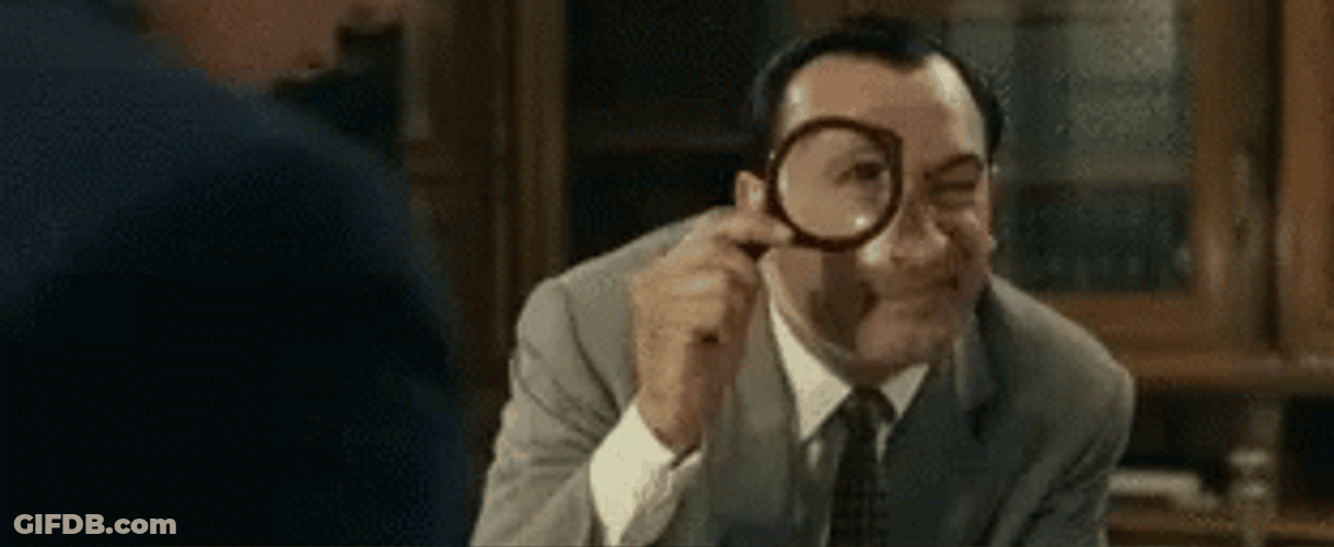 Spying Using Magnifying Glass GIF