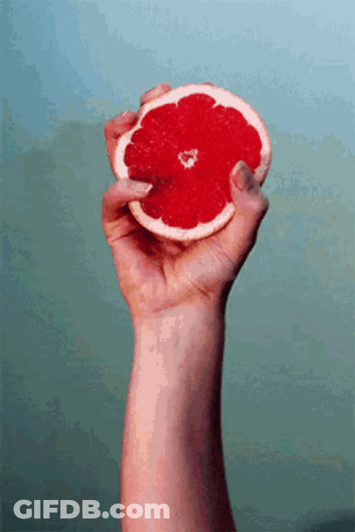 Squeezing Juicy Blood Orange GIF