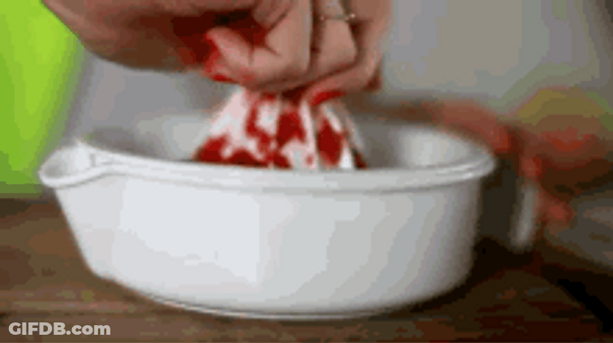 Squeezing Juicy Blood Orange GIF