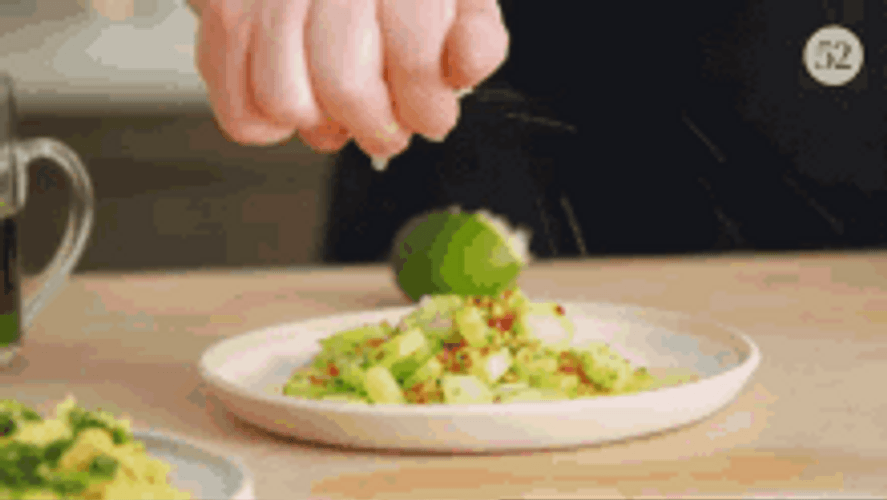 Squeezing Juicy Lime To Salad GIF