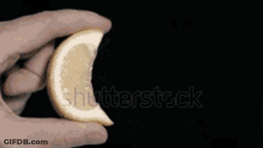 Squeezing Juicy Orange Slow Motion GIF