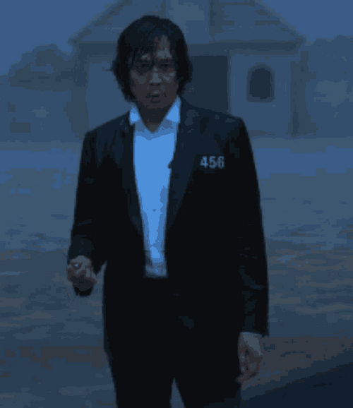 Squid Game Seong Gi-Hun Holding Knife GIF