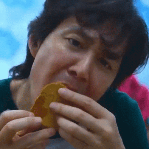 Squid Game Seong Gi-Hun Licking GIF