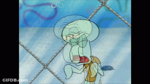 Squidward Behind Chain Link Fence GIF
