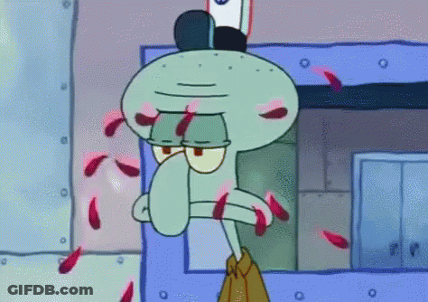 Squidward Behind Chain Link Fence GIF