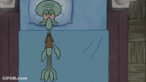 Squidward From Spongebob Is Wrapped In A Blue Towel GIF