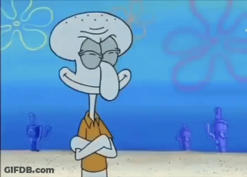 Squidward From Spongebob Squarepants Is Holding A Frisbee In His Hands . GIF