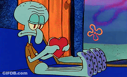 Squidward From Spongebob Squarepants Is Holding A Heart In His Hands . GIF