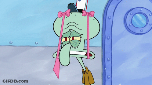 Squidward From Spongebob Squarepants Is Holding A Mop In His Hand GIF