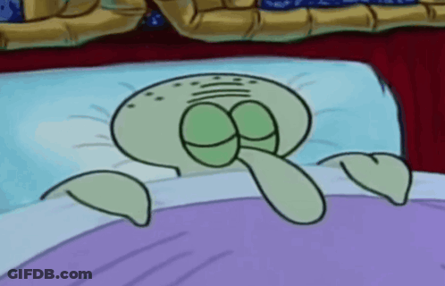 Squidward From Spongebob Squarepants Is Laying In Bed GIF