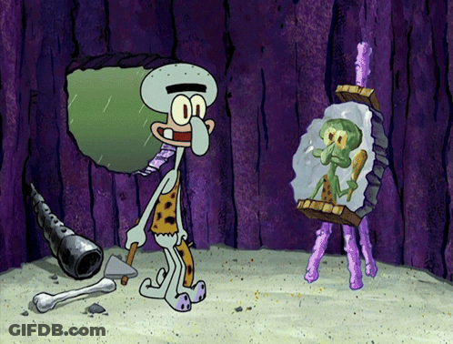 Squidward From Spongebob Squarepants Is Looking At His Reflection In A Mirror GIF