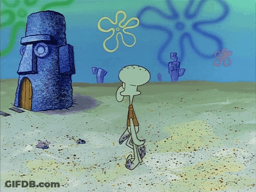 Squidward Standing In Front Of Statue GIF