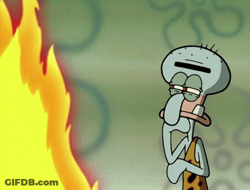 Squidward From The Cartoon Spongebob Squarepants Stands In Front Of A Fire GIF