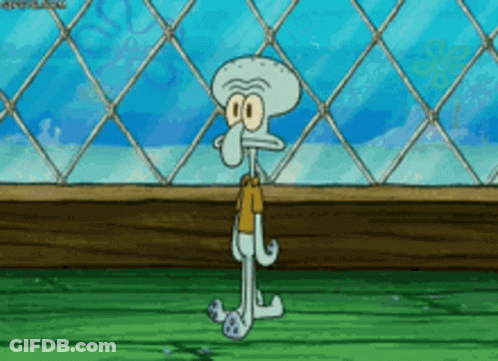 Squidward Standing In Front Of Fence GIF