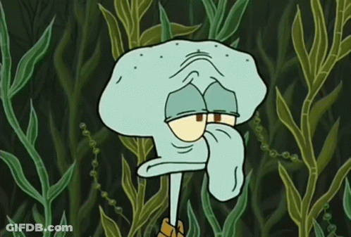 Squidward Surrounded By Seaweed And Plants GIF