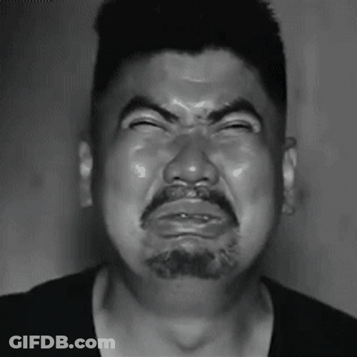 Squinting Eyes Funny Puckered Face GIF