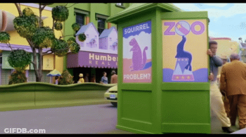 Squirrel Zoo Sign On Green Building GIF