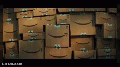Stack Of Amazon Boxes With Smiley Faces GIF