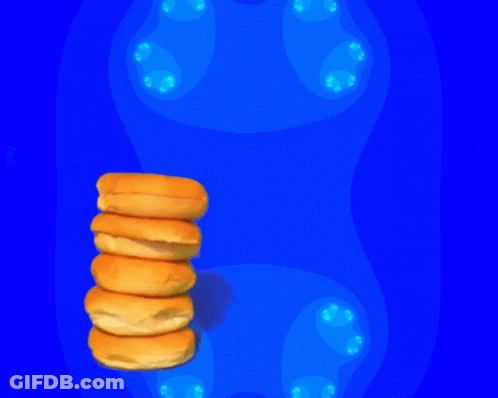 Stack Of Doughnuts On Blue Background GIF