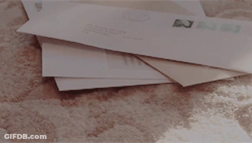 Stack Of Envelopes With USPS Stamp GIF
