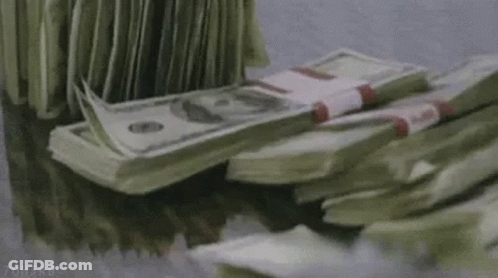 Stack Of Money On Pile GIF