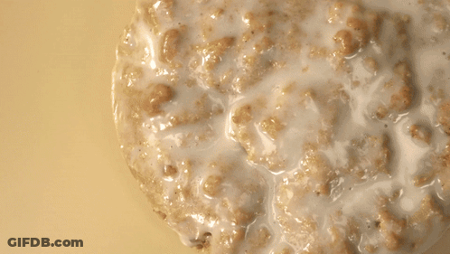 Stack Of Pancakes Being Poured With Milk GIF