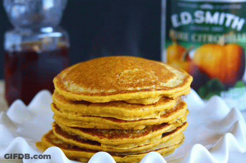 Stack Of Pancakes Next To Ed Smith Bottle GIF