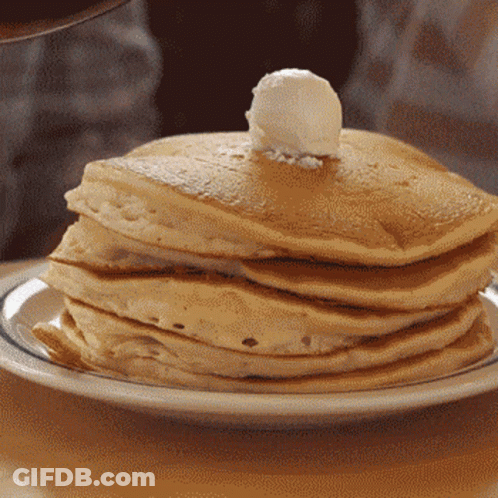 Stack Of Pancakes With Syrup And Butter GIF