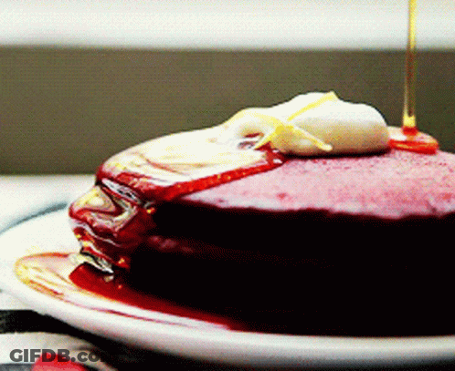 Stack Of Pancakes With Syrup And Whipped Cream GIF