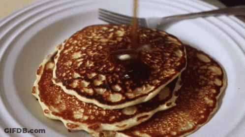 Stack Of Pancakes With Syrup Being Poured GIF