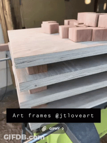 Stack Of Wooden Boards Saying Art Frames GIF