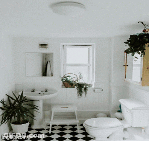 Stacked Metal Pipes In Room GIF