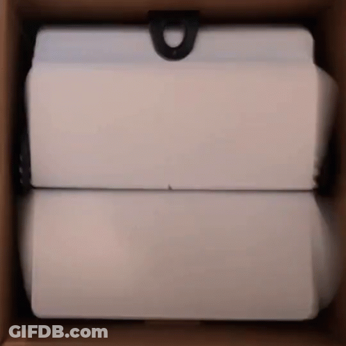 Stacked White Boxes In Cardboard GIF