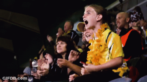 Stadium Group One Wearing Yellow Shirt Saying A GIF