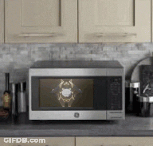 Stainless Steel Microwave On Kitchen Counter GIF