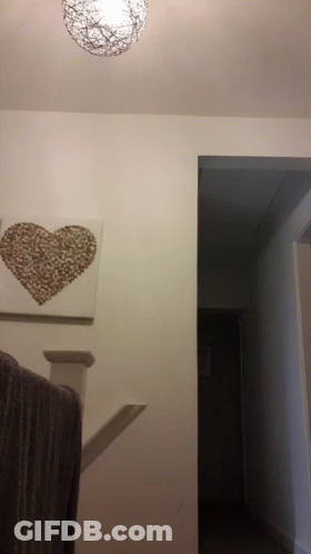 Staircase With Picture Of A Heart GIF