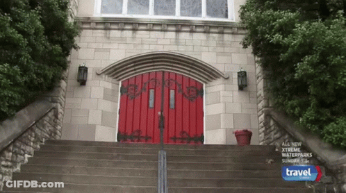 Stairs Leading Up To A Red Door That Says Travel GIF