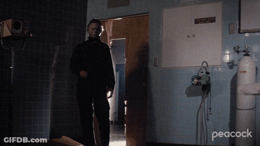 Stalking Killer Michael Myers Wielding Knife GIF