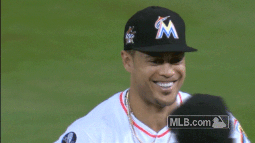 Stanton Smilling Passes Teammates GIF