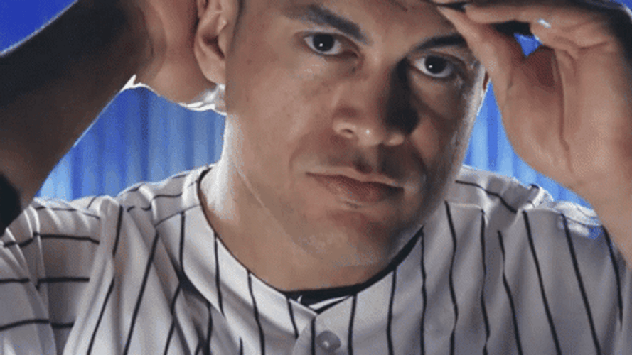 Stanton Wears Cap Poses GIF