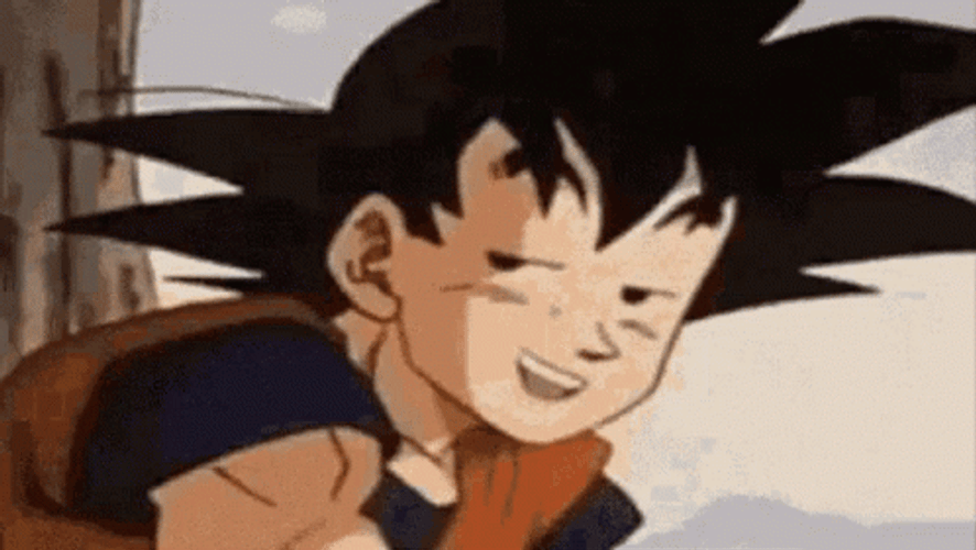 Staring And Grinning Goku Meme GIF