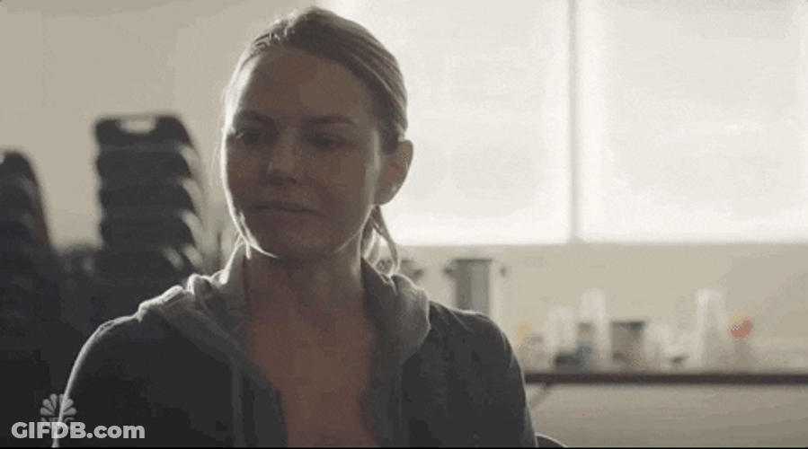 Startled Lady Reacting To Glass Breaking GIF
