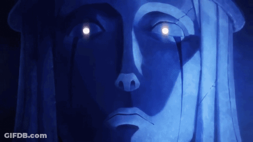 Statue Face With Glowing Eyes In Dark GIF