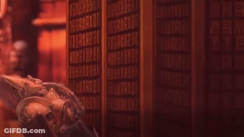 Statue In Front Of Number Wall Saying Why GIF