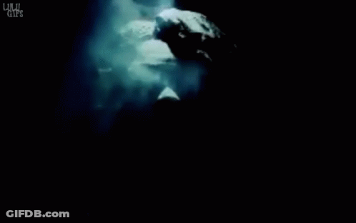 Statue Of A Man Surrounded By Smoke Saying Lulu Girls GIF