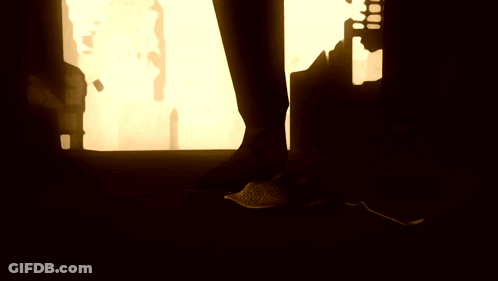 Statue Of Crowned Man In Dark Room GIF