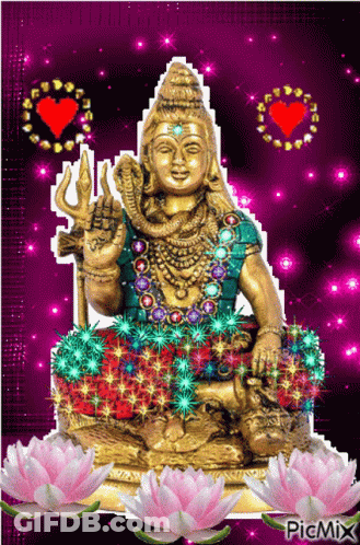 Statue Of Deity Surrounded By Pink Flowers GIF