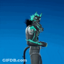 Statue Of Devil With Horns And Tail In Front Of Blue Sky GIF